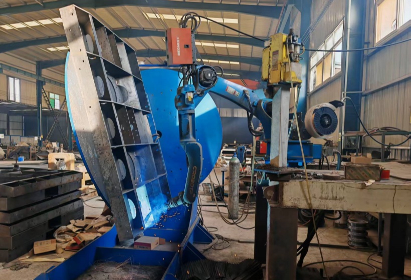 How can precise robotic welding improve the performance of concrete mixing equipment?